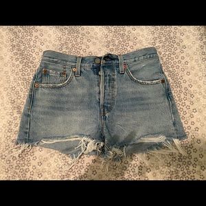 501 Light Blue Distressed Denim Cutoff Shorts